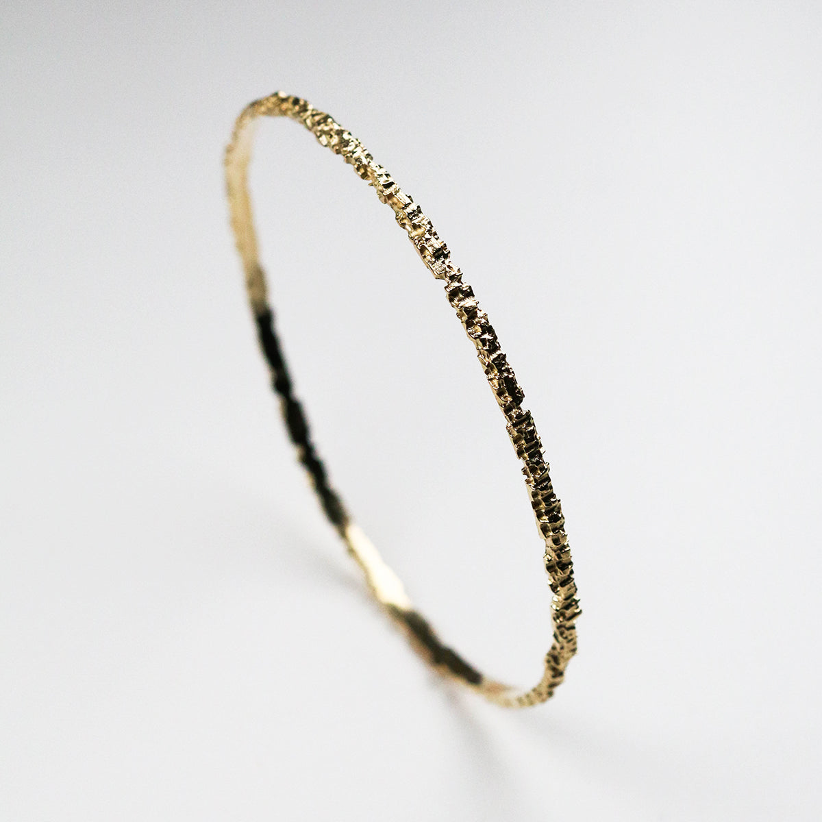 This bangle measures around 3mm in width and look great both on its own and stacked with other bracelets.