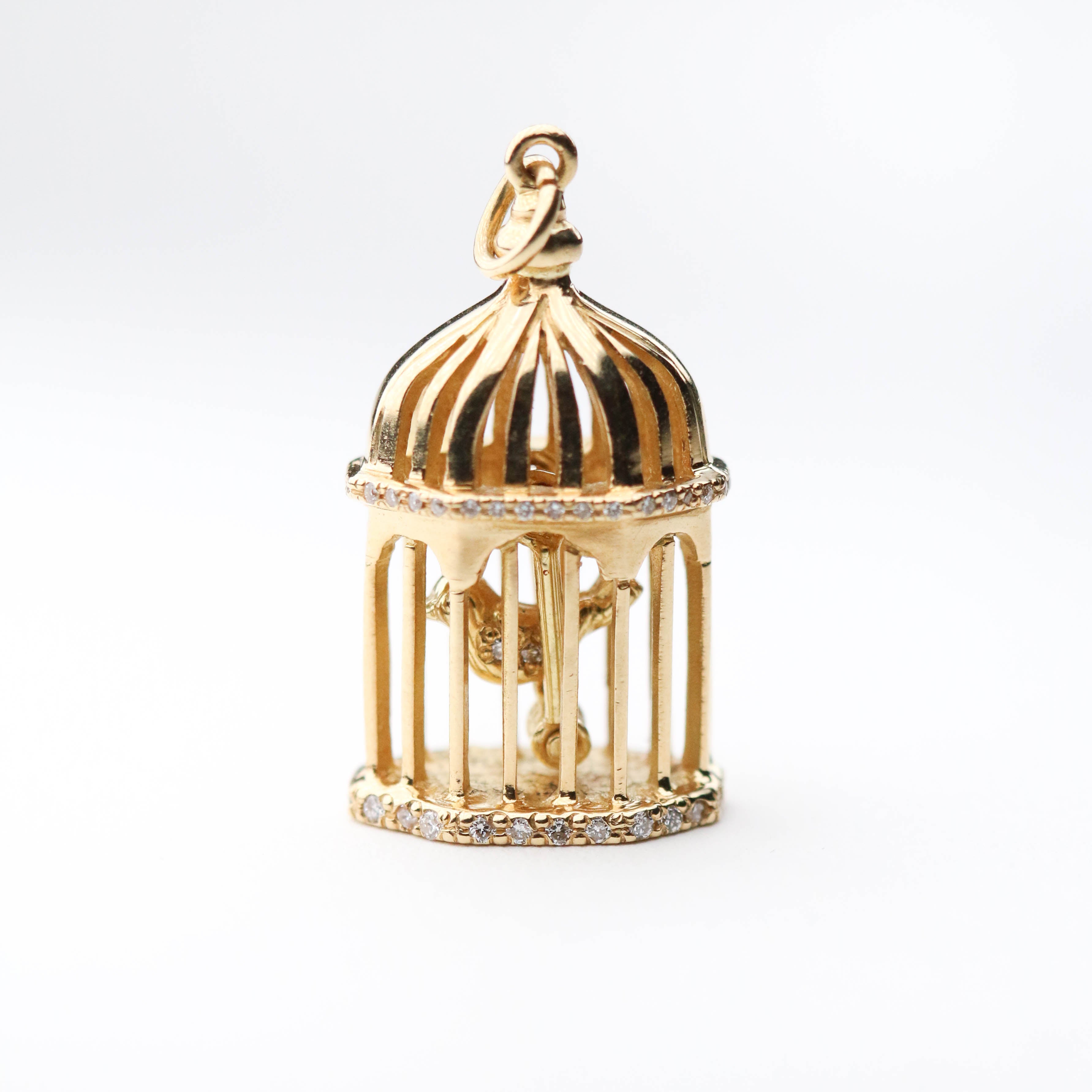 18ct gold bird cage with diamonds