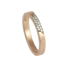 Handmade in 18ct rose gold, measuring 3mm in width and pavé set with 14 white diamonds totalling 0.28ct.