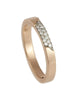 Handmade in 18ct rose gold, measuring 3mm in width and pavé set with 14 white diamonds totalling 0.28ct.