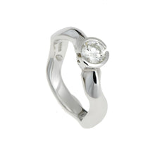 Carved round diamond solitaire in platinum