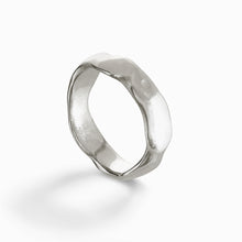 The medium Carved band is handmade in solid silver and is 6mm wide.