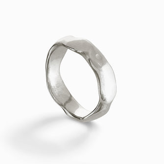 The medium Carved band is handmade in solid silver and is 6mm wide.