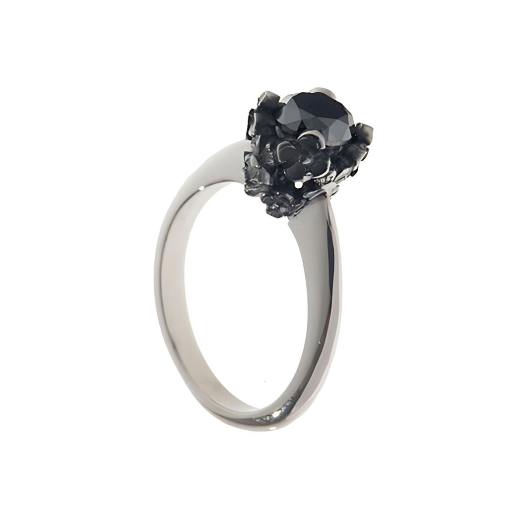 platinum engagement ring with a 1 carat black diamond