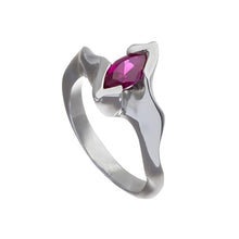 This beautifully unusual piece is handmade in silver and set with a gemstone of your choosing with asymmetric shoulders, and a polished inside band for maximum comfort.