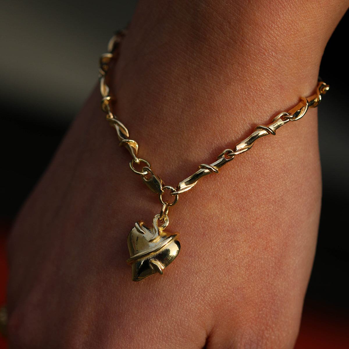 gold heart bracelet - Entwine collection - on wrist