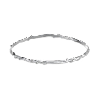 A simple and elegant piece from Jeremy Hoye's acclaimed Entwine collection, this bangle measures around 3mm in width and looks great both on its own and stacked with other bracelets.