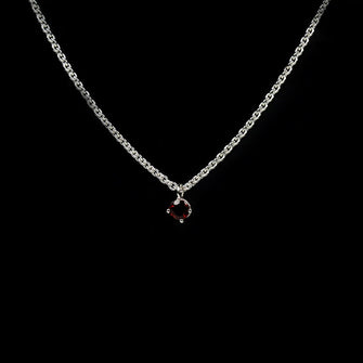 This stunning piece showcases a vibrant 5mm synthetic ruby, set in Jeremy Hoye's distinctive Entwine design. The pendant hangs gracefully from an 18" fine silver trace chain, secured with a dependable trigger clasp.