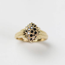 The detail on the ring resembles bark from oak forests. Forest, 18ct yellow gold pavé set cluster hand carved ring, set with .30pt treated black diamonds.