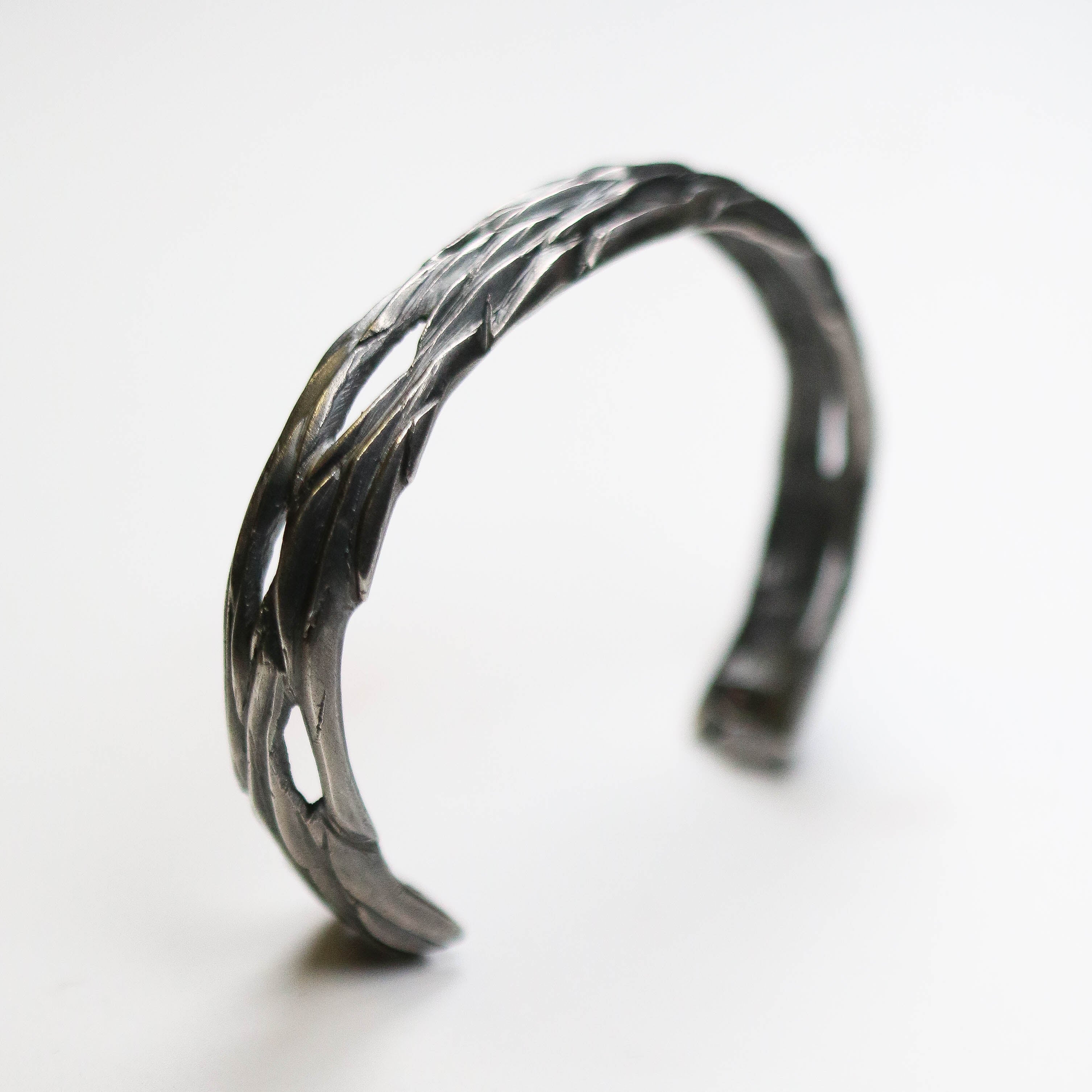 Forest Oxi Bangle. The detail resembles bark from oak forests.