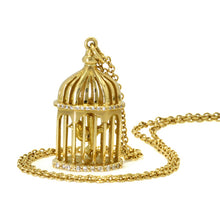 gold birdcage with diamonds and a gold chain