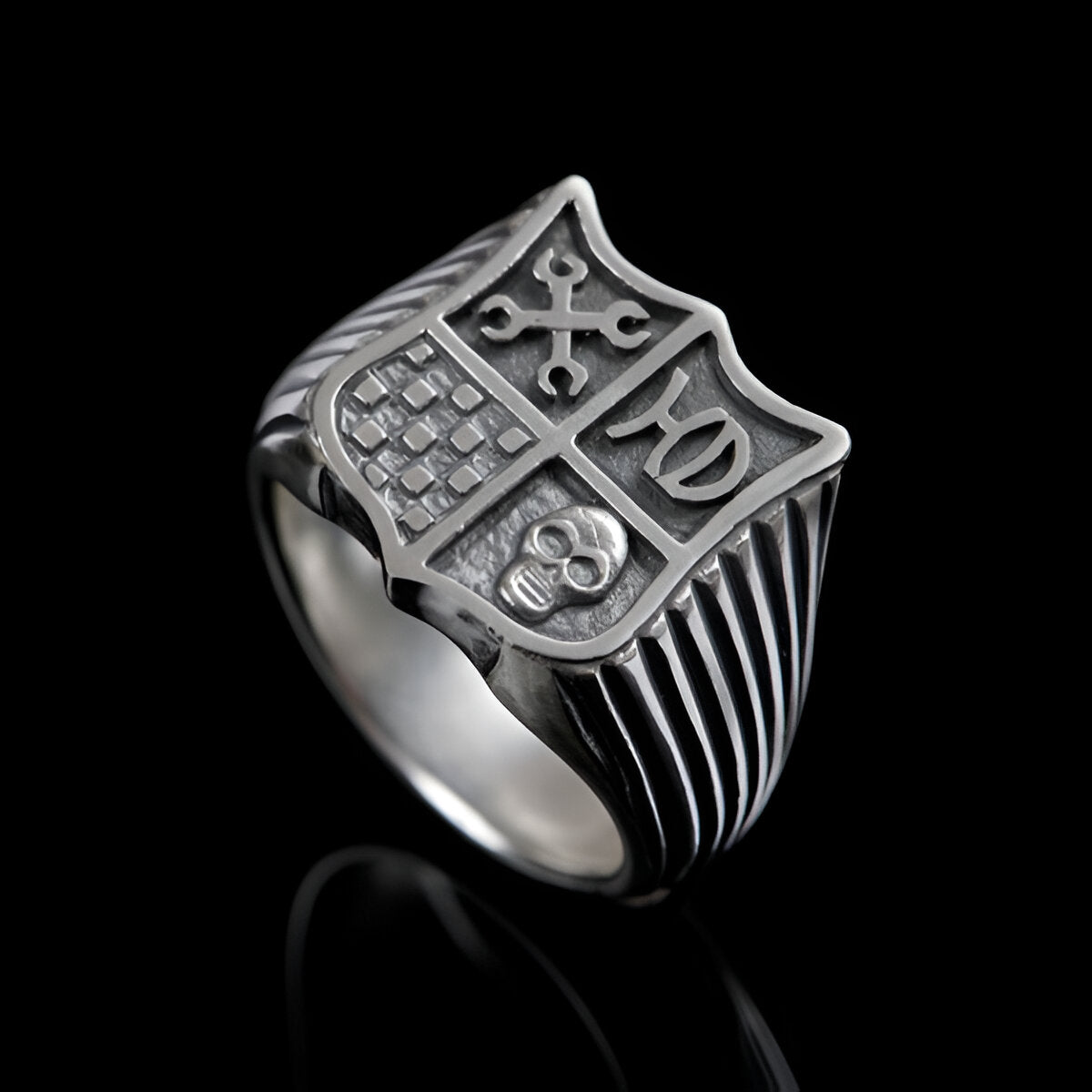 Silver classic shield shaped signet ring.