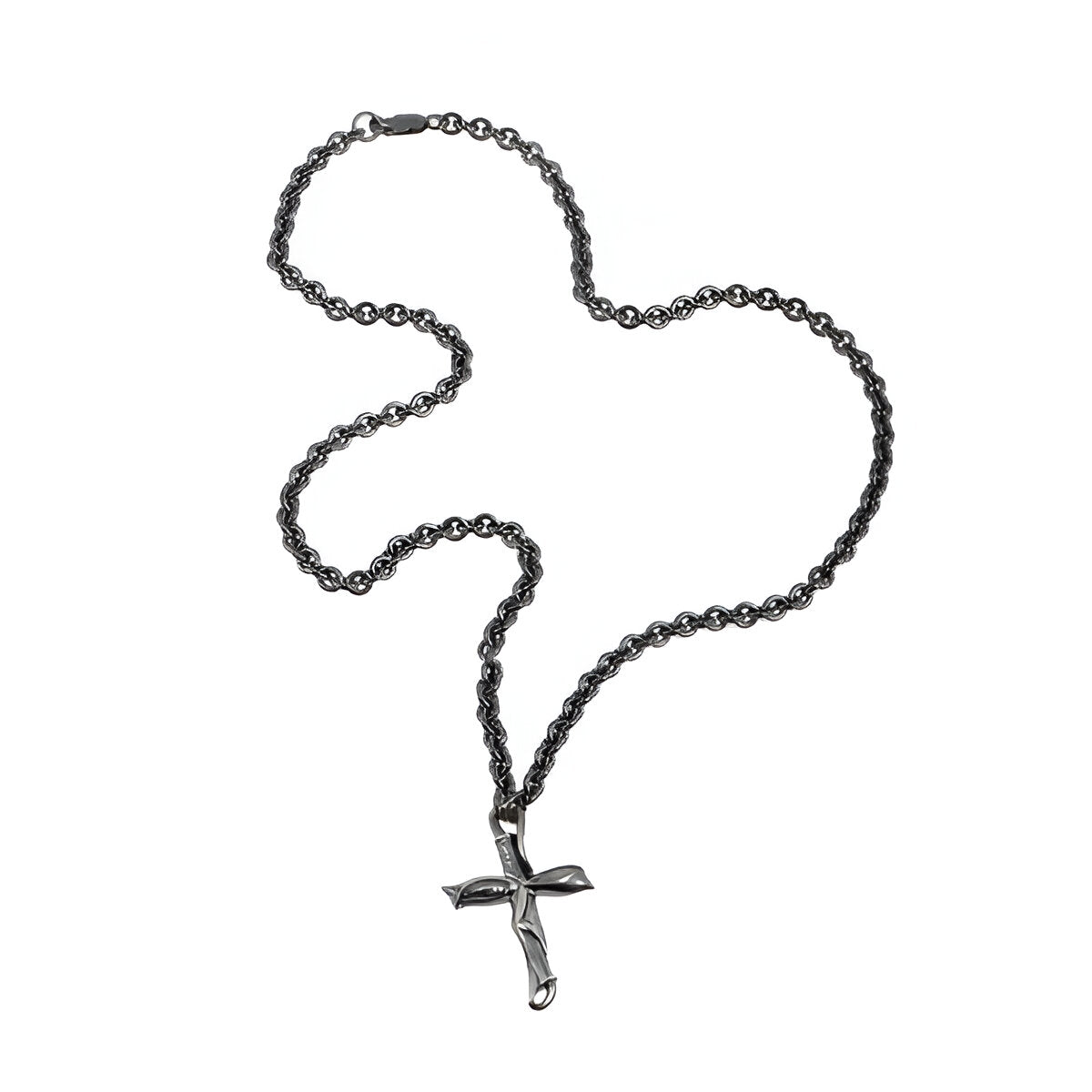 The cross has a fluid, oval design and textured inlaid detail. It measures 30mm long and sits on a 20" cable chain.