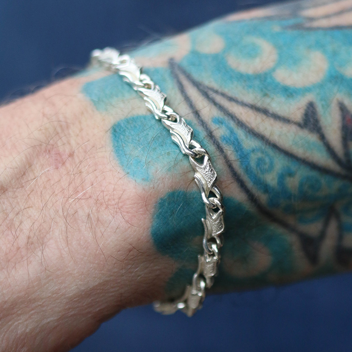 Libertine oxidised silver serpent link bracelet.