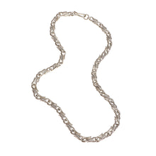 From Jeremy's Libertine collection, this necklace is made up of individual handmade silver links. The necklace measures 18" in length.