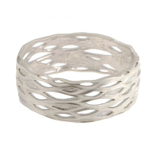 Libertine Silver statement wide hinged bangle with fluid cut out ovals and textured inlays. Bangle measures 26mm.