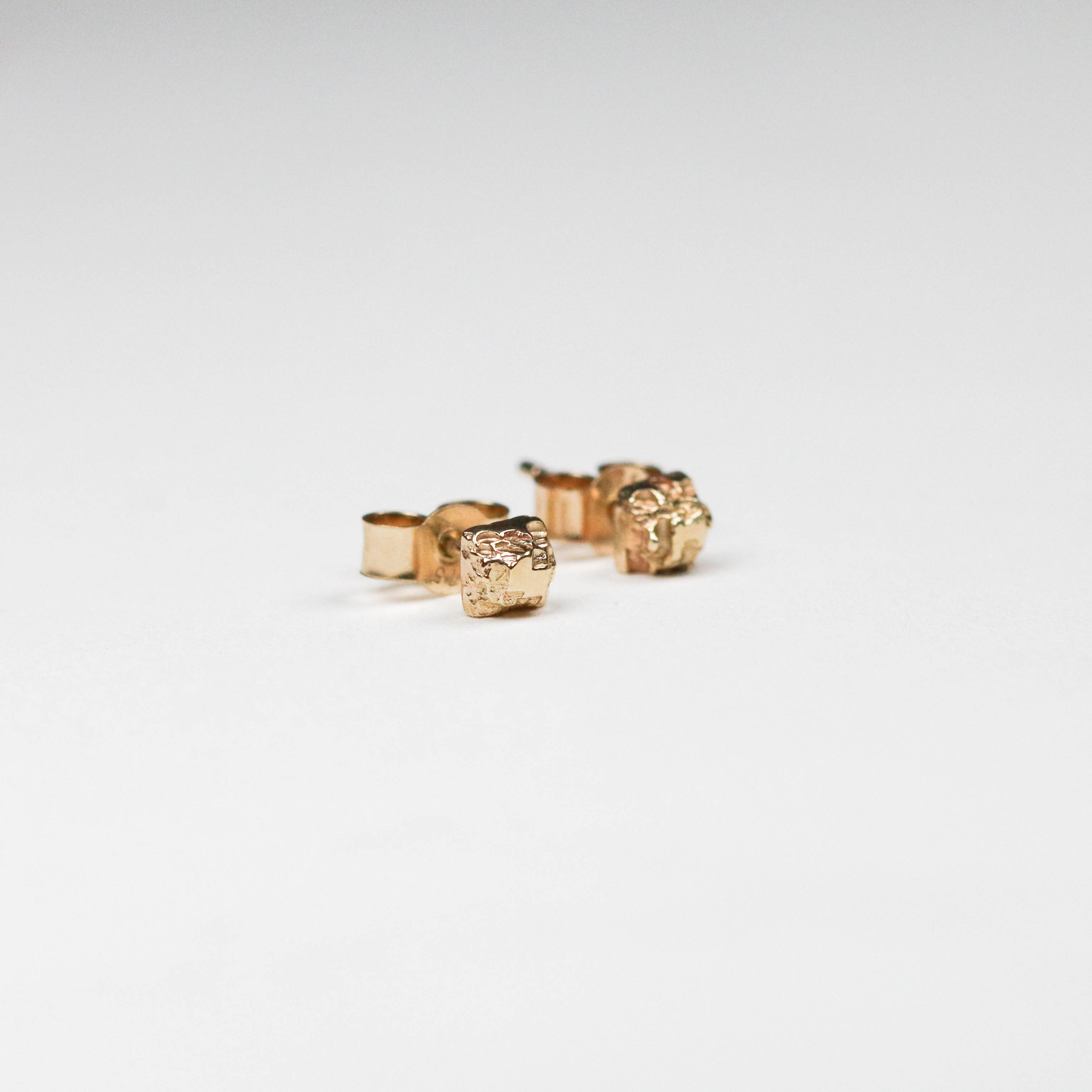 Crafted exclusively in 9ct yellow gold, these pieces are the smallest yet in Jeremy's repertoire.