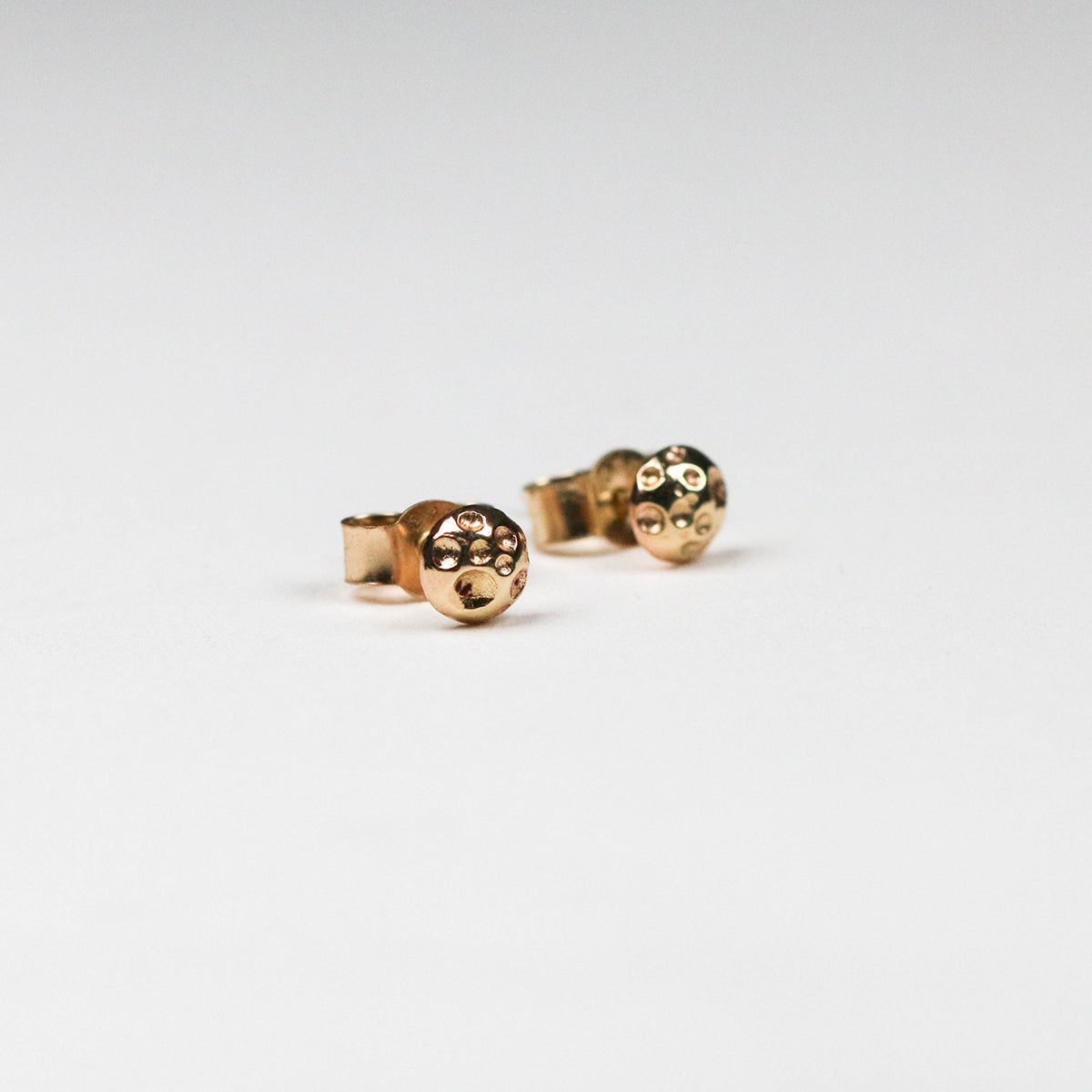 Crafted exclusively in 9ct yellow gold, these pieces are the smallest yet in Jeremy's repertoire.