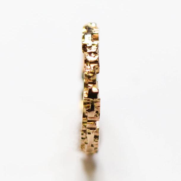 A unique and versatile textured band ring from Jeremy's Luna collection. This stackable piece measures 2.5mm in width.