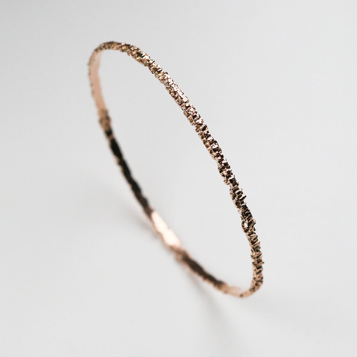 This bangle measures around 3mm in width and look great both on its own and stacked with other bracelets.