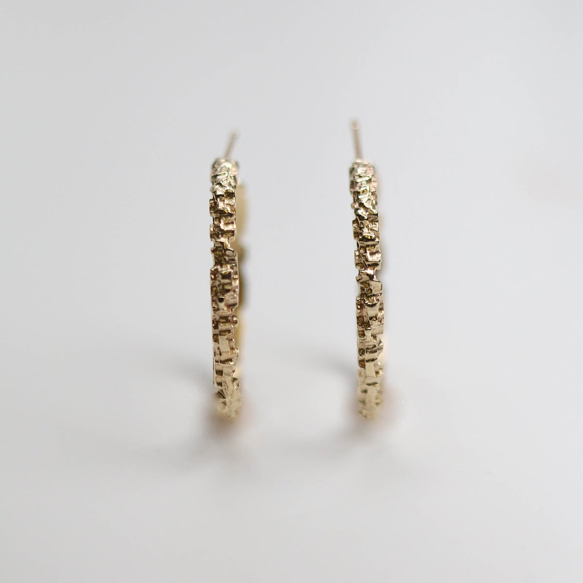 Luna 9ct yellow gold textured hoops. Handmade in 9ct gold. These earrings measure at 30mm circumference with a 3mm width.