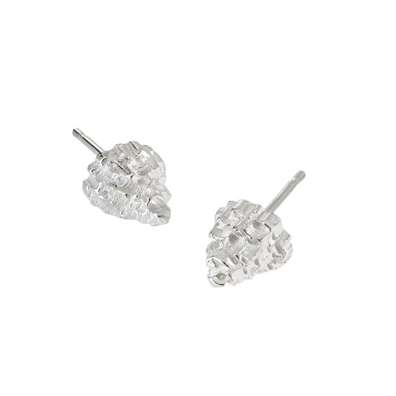 These Cone Lunas come in a silver finish. These textured studs measure 7mm wide and 8mm in length.