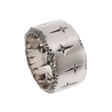 Trinity 18ct white gold band measuring 14mm in width. Set with 10 black diamonds totalling .30pts of a carat.