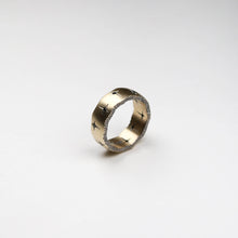 Trinity 9ct yellow gold band measuring 8mm in width with 10 black diamonds.