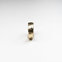 Trinity 9ct yellow gold band measuring 8mm in width with 10 black diamonds.