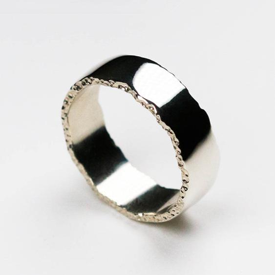 Trinity textured edge ring measuring 8mm in width in platinum.