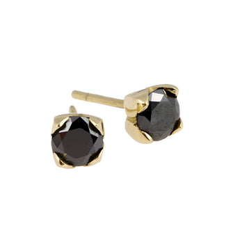 Featuring two impressive round .50pt black diamonds (weighing a carat in total), which sit proudly in four-petal settings, handmade in 18ct yellow gold.