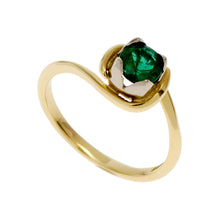 A simple, fine band handmade in 18ct yellow gold with contrasting rose gold four-petal setting. Set with .50pt (half carat) round emerald. 