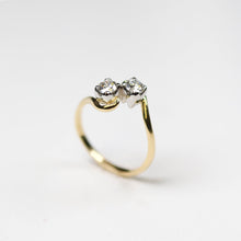 A popular collection, Tulip, handmade in 18ct yellow gold featuring two .25pt diamonds set on a platinum tulip petal.