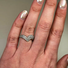 Handmade in Platinum this stunning piece is pavé set with white diamonds. This ring measures 6mm at its widest point and tapers down to 3mm.