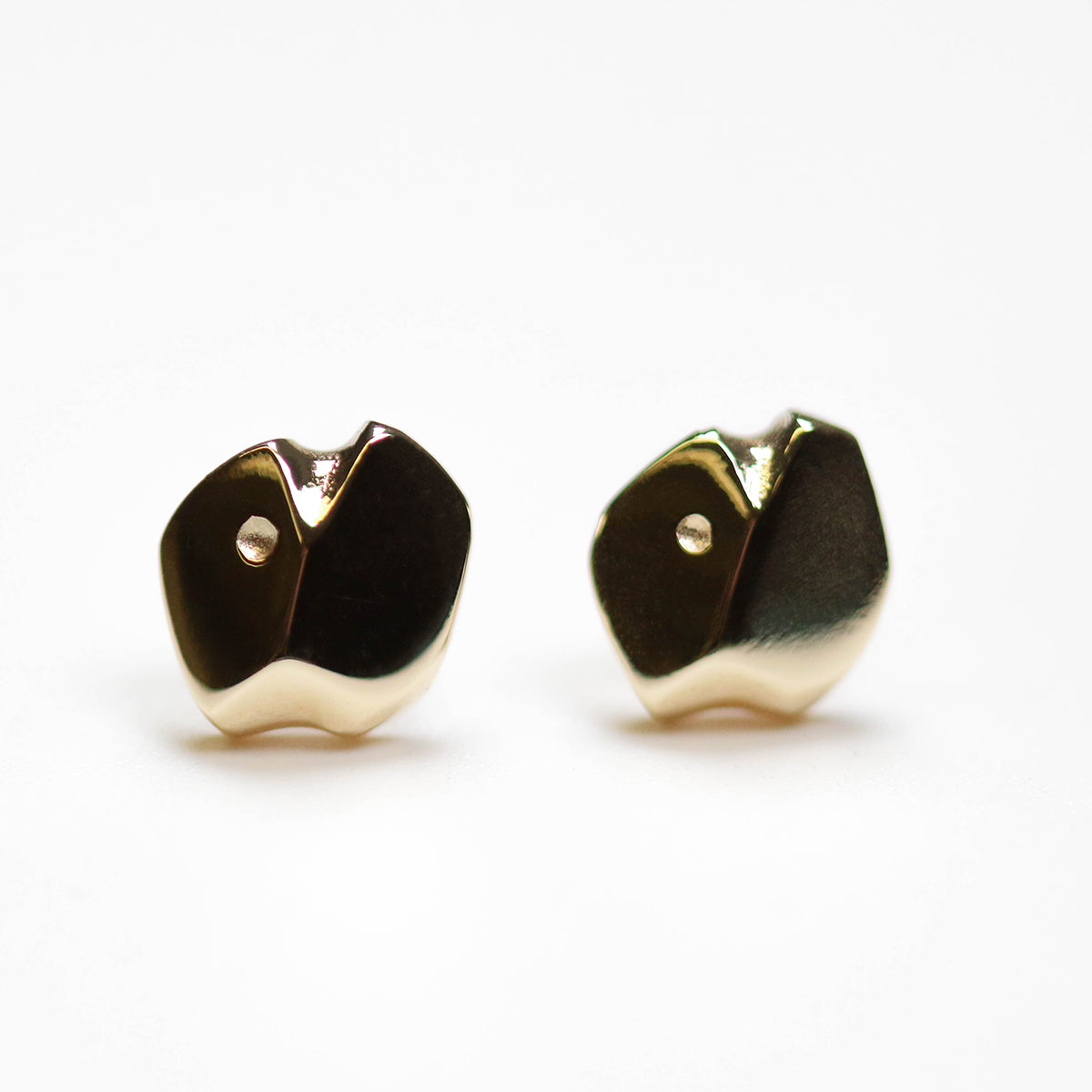 9ct gold studs from the Carved collection