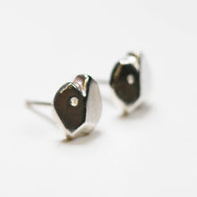 These earrings are handmade in solid silver and are hand-carved to comfortable and perfect for everyday wear.