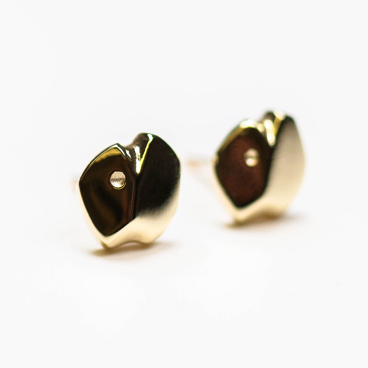 9ct gold studs from the Carved collection